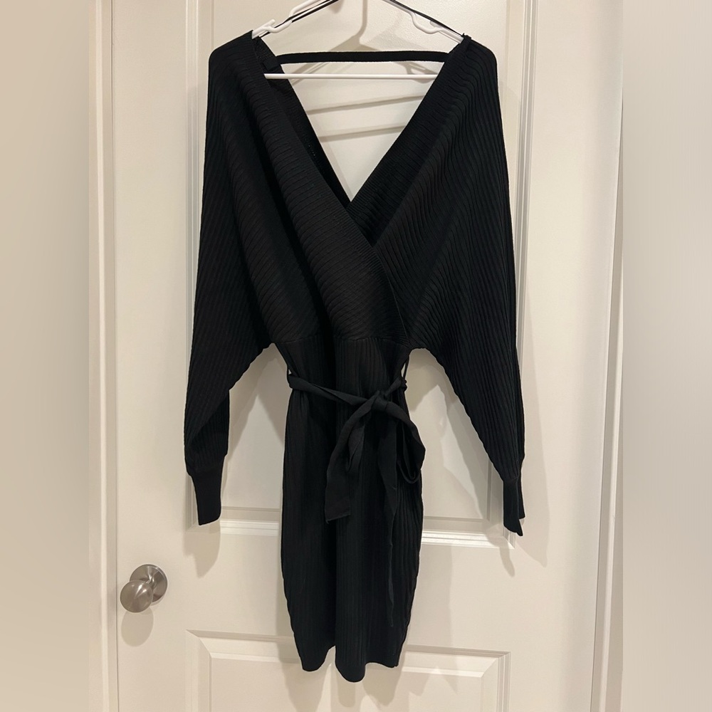 Off shoulder black ribbed knit dress